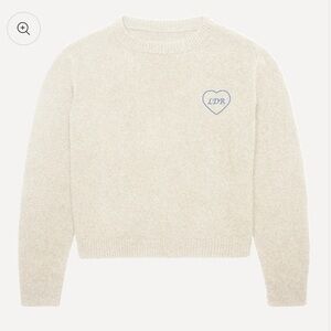 Women's Lana del Rey Cream Sweater with small blue heart and “ldr” embroidered